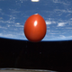Image for article titled Yes, this is a fresh tomato orbiting in space at 4.8 miles per second